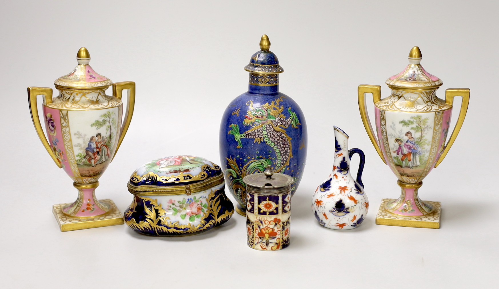 A pair of Vienna style porcelain pink ground vases, late 19th century, a Sevres style trinket box, and other ceramics. Tallest 16cm